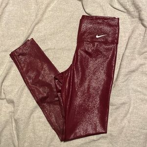 Shiny maroon Nike leggings